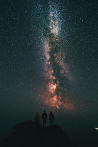 Preview wallpaper starry sky, people, milky way, night, sky