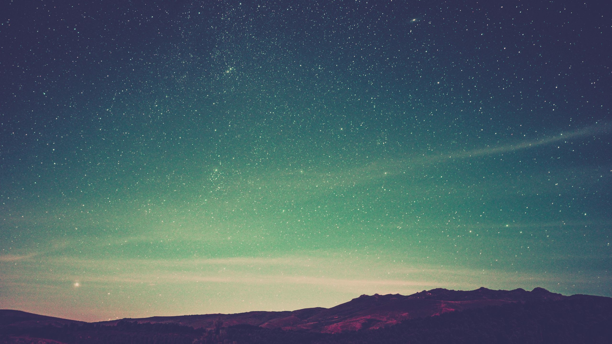 Download wallpaper 2560x1440 starry sky, radiance, mountains, sky ...