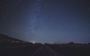 Preview wallpaper starry sky, railway, sky