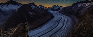 Preview wallpaper starry sky, road, rocks, twisting