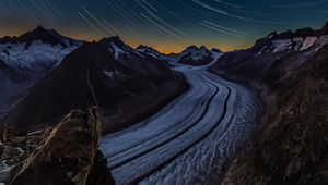 Preview wallpaper starry sky, road, rocks, twisting