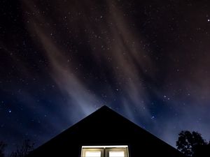 Preview wallpaper starry sky, roof, night, window