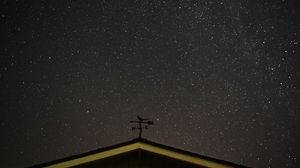 Preview wallpaper starry sky, roof, weather vane