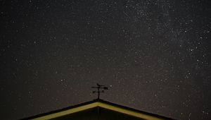 Preview wallpaper starry sky, roof, weather vane