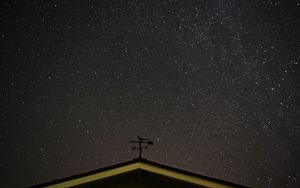 Preview wallpaper starry sky, roof, weather vane