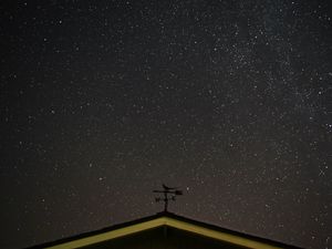 Preview wallpaper starry sky, roof, weather vane