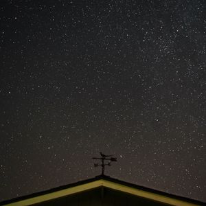 Preview wallpaper starry sky, roof, weather vane