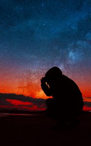 Preview wallpaper starry sky, silhouette, hood, night, stars