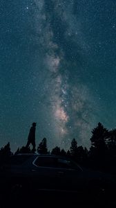 Preview wallpaper starry sky, silhouette, milky way, car, trees, night