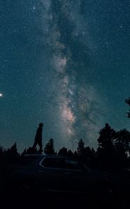 Preview wallpaper starry sky, silhouette, milky way, car, trees, night