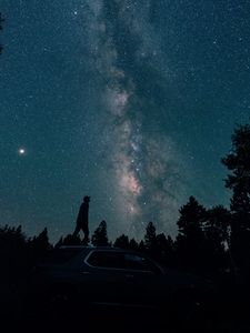 Preview wallpaper starry sky, silhouette, milky way, car, trees, night