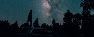 Preview wallpaper starry sky, silhouette, milky way, car, trees, night