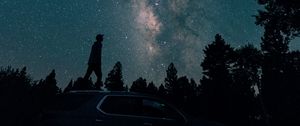 Preview wallpaper starry sky, silhouette, milky way, car, trees, night