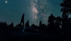 Preview wallpaper starry sky, silhouette, milky way, car, trees, night