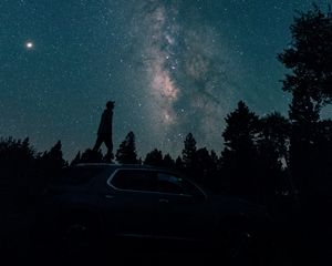 Preview wallpaper starry sky, silhouette, milky way, car, trees, night
