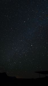 Preview wallpaper starry sky, sky, night, stars, silhouette, building