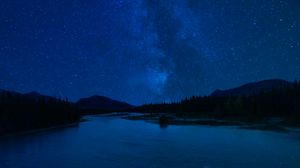 Preview wallpaper starry sky, stars, forest, lake, night