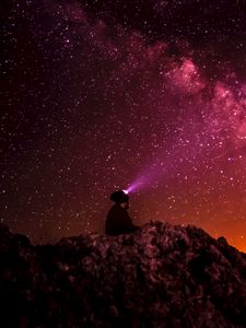 Preview wallpaper starry sky, stars, man, light, glitter