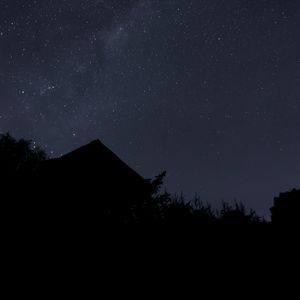 Preview wallpaper starry sky, stars, roof, silhouette, night