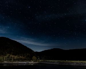Preview wallpaper starry sky, stars, trees, night, eifel national park, germany
