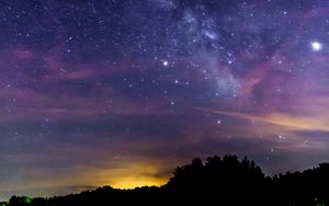 Preview wallpaper starry sky, stars, trees, silhouette, nebula