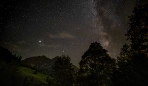Preview wallpaper starry sky, stars, trees, mountains, night, nature