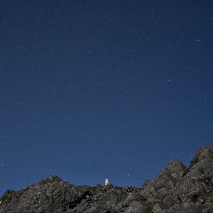 Preview wallpaper starry sky, stones, nature