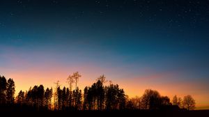 Preview wallpaper starry sky, trees, sunset, night, forest