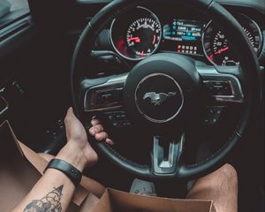 Preview wallpaper steering wheel, machine, hand, donuts, tattoo