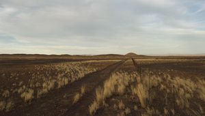 Preview wallpaper steppe, hills, grass, fence