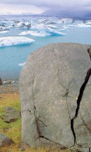 Preview wallpaper stone, cranny, coast, glaciers, water, cold