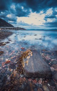 Preview wallpaper stone, pebbles, sea, horizon, sky