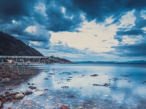 Preview wallpaper stone, pebbles, sea, horizon, sky