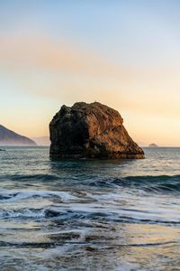 Preview wallpaper stone, rock, sea, waves, sky