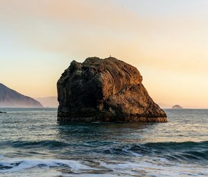 Preview wallpaper stone, rock, sea, waves, sky