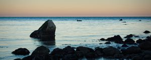 Preview wallpaper stone, sea, twilight, horizon