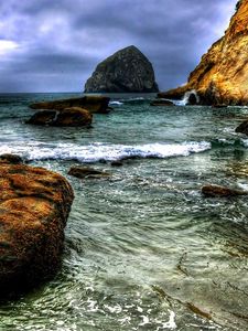 Preview wallpaper stone, water, sea, silt, sky