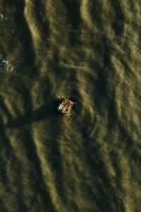 Preview wallpaper stone, water, waves, aerial view, wavy, ripples