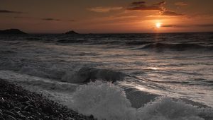 Preview wallpaper stones, beach, sea, sun, sunset