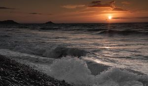 Preview wallpaper stones, beach, sea, sun, sunset