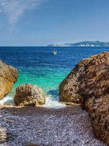 Preview wallpaper stones, beach, sea, pebbles, boat