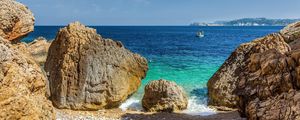 Preview wallpaper stones, beach, sea, pebbles, boat