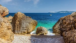 Preview wallpaper stones, beach, sea, pebbles, boat