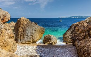 Preview wallpaper stones, beach, sea, pebbles, boat