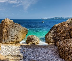 Preview wallpaper stones, beach, sea, pebbles, boat