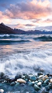 Preview wallpaper stones, beach, wave, foam, mountains, clouds, water