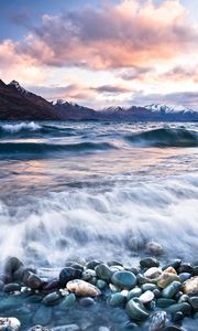 Preview wallpaper stones, beach, wave, foam, mountains, clouds, water