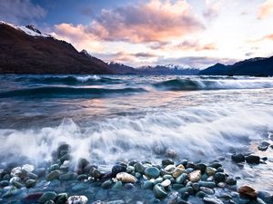 Preview wallpaper stones, beach, wave, foam, mountains, clouds, water