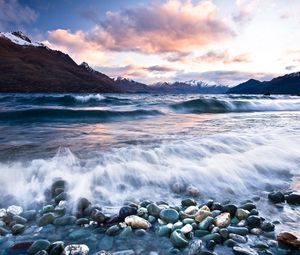 Preview wallpaper stones, beach, wave, foam, mountains, clouds, water