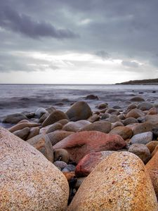 Preview wallpaper stones, boulders, landscape, sea, shore, horizon